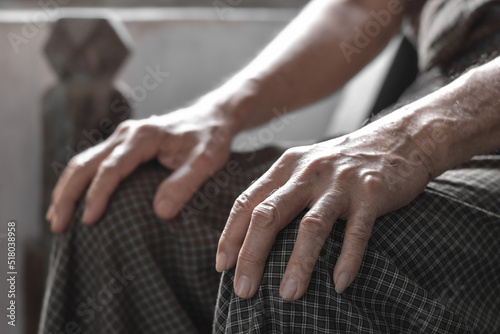 Hand of Asian elder man. Concept of rheumatoid arthritis, osteoarthritis, or joint pain © ZayNyi