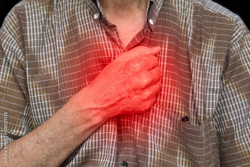 Fotografie Asian man suffering from central chest pain