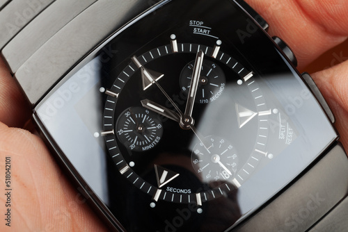 Square shaped Swiss made chronograph wrist watch photo