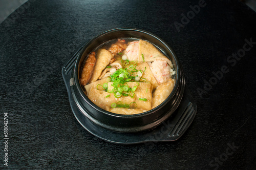Photos Korean Odeng Tang/Eomuk/Odeng Guk, Korean fish cake soup in traditional pot on b