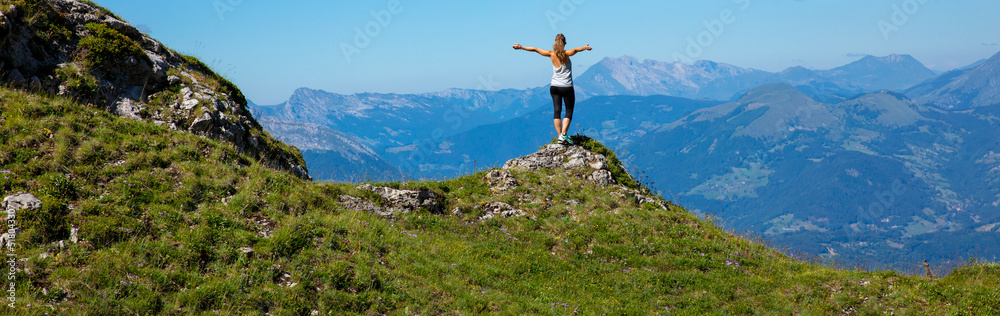 woman hiking massif des Bauges panoramic view ( haute savoie) woman hiking massif des Bauges panoramic view ( haute savoie)