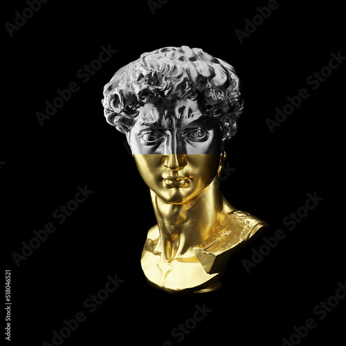 Silver statue of David's head. Gold David statue isolated on dark background. 