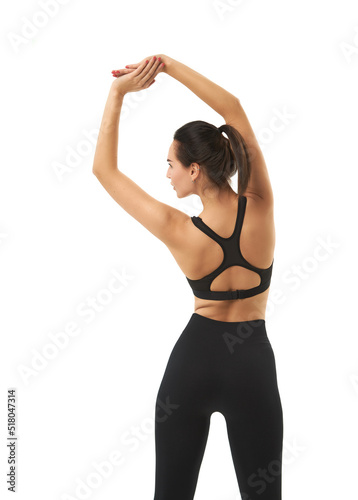 Perfect slim tanned young female body in sportswear. Concept perfect body, no fat, motivation, healthy lifestyle, fitness routine. Isolated white background.