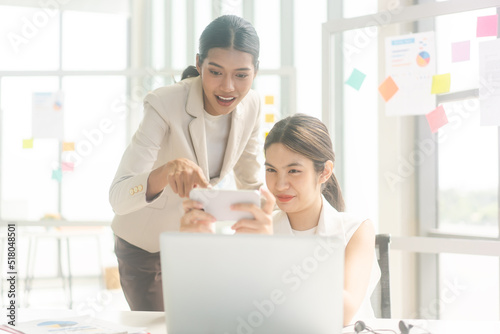 wo young adult business woman resting with mobile phone for streming or game online in office on day