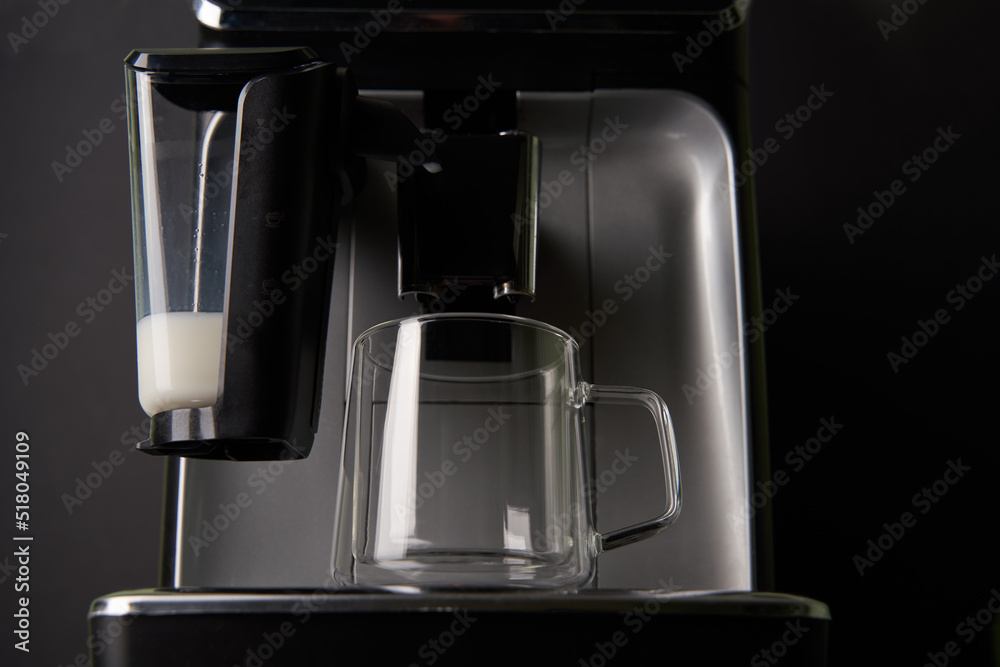 Coffee machine and empty glass cup. Coffee machine and empty glass cup.