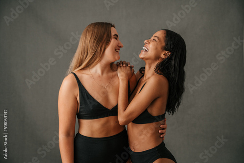 Фотография Two friends just having lots of fun while posing in the studio