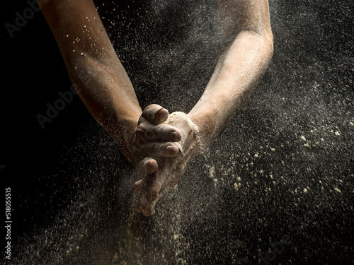 Hands with white dust splash