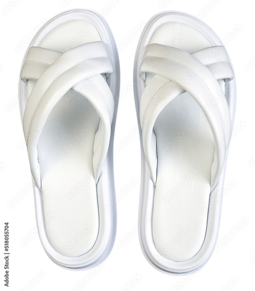 Women's summer white slippers isolated on a white background. Slippers. blank for design Women's summer white slippers isolated on a white background. Slippers. blank for design