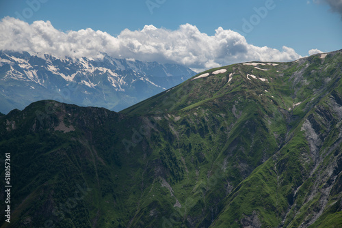 Beautiful mountains landscape. Panoramic view on the green hills and mountains under clouds . © Inga Av