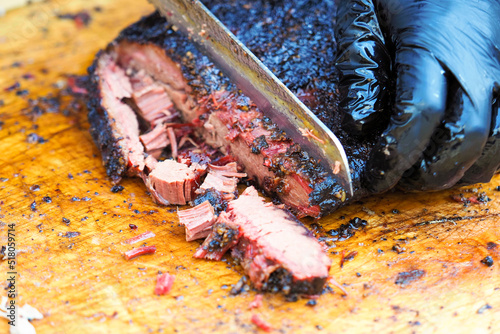 Photos Cutting the finished brisket with a knife