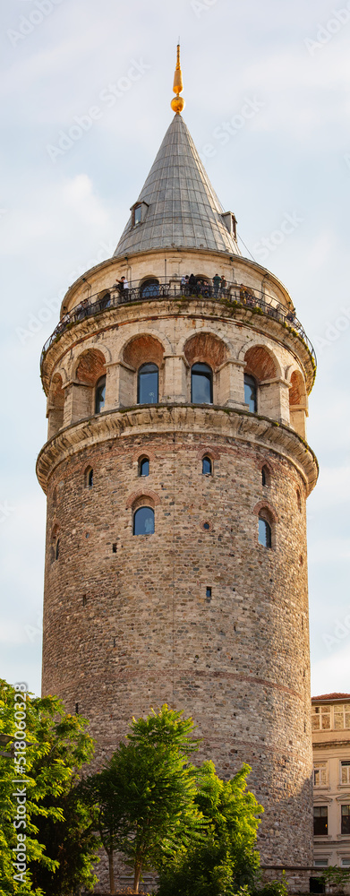 Galata Tower, Istanbul, Turkey (Turkiye). Best observation desk in Istanbul in summer day. Vertical detailed panorama. Travel and historical concept