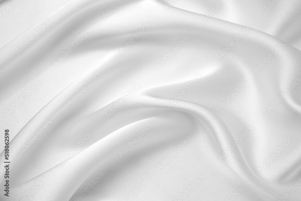 Smooth elegant white silk or satin luxury cloth texture can use as wedding background. Luxurious background design. Smooth elegant white silk or satin luxury cloth texture can use as wedding background. Luxurious background design.