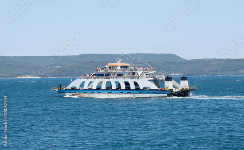 Car ferry, an old car ferry that sails on the Bosphorus in the Turkish province of Canakkale or Dardanel. photo