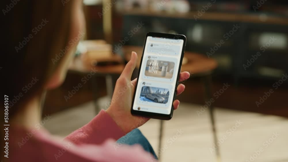 Close-up: Person Using Smartphone, Browsing through Pictures, Videos and Posts on Social Media App. Scrolling Mock-up Application with Feed with Posts: Travel, Animals, Food, Creativity,