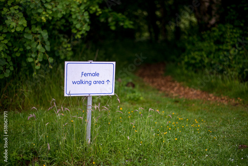 a sign informing about the boundaries of the area for women in the meditation center