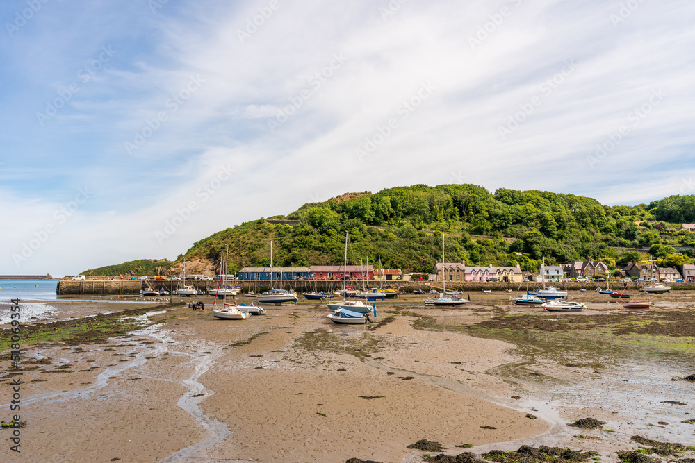 Seascape of  Fishguard lower town harbor during low tide on the coast of Pembrokeshire, in Wales, UK