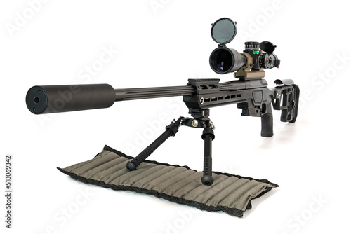 A sniper rifle with an optical sight under the bipod mat