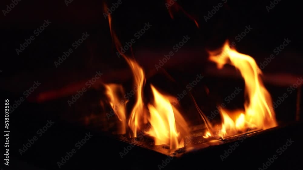 A fire for the preparation of the barbecue in slow motion. A fire for the preparation of the barbecue in slow motion.