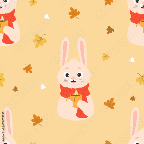 Autumn seamless pattern with funny rabbit in knitted scarf with cup of hot tea on light beige background with autumn leaves. Vector illustration. Cute baby collection, for design, decor, packaging .