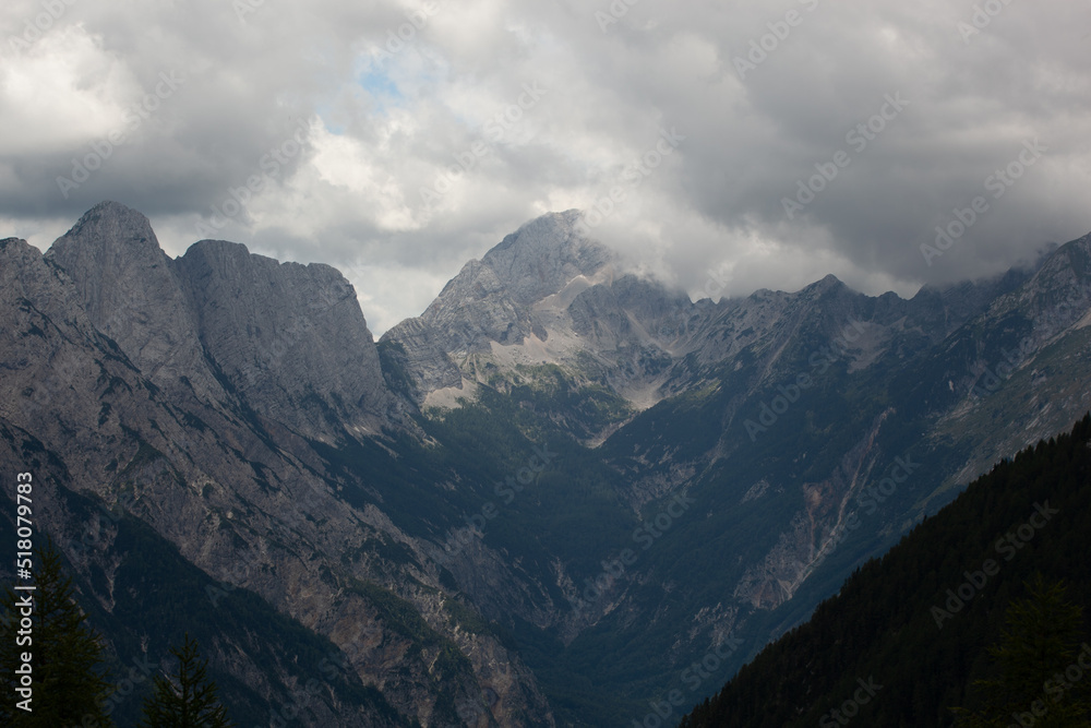view of a mountain range. high mountain landscape, the peaks are without vegetation only rocky, the sky is overcast.