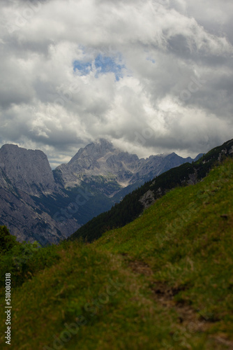 view of a mountain range. high mountain landscape, the peaks are without vegetation only rocky, the sky is overcast. © Florent Baudy 