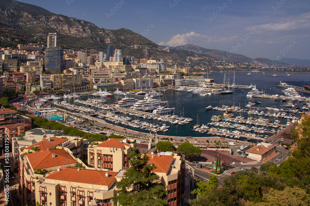 Panoramic aerial view of Monaco and Port Hercule, sweeping views of the city, mountains and harbor, luxury yachts and apartments in La Condamine district, city centre Monte Carlo, Monaco,Cote d'Azur