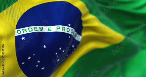 Close-up view of the Brazilian national flag waving in the wind. photo