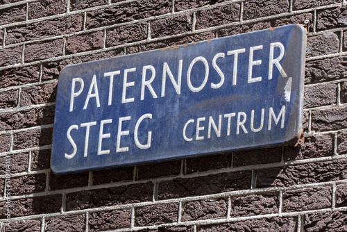 Fotografie, Obraz Street Sign Paternostersteeg At Amsterdam The Netherlands 11-6-2022