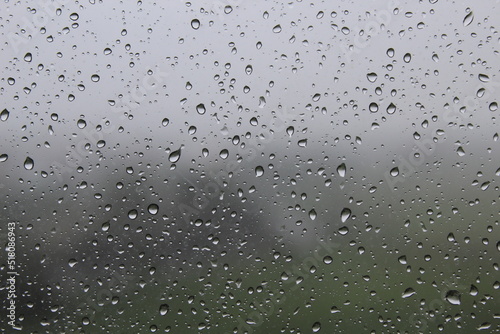 Raindrops on the window and rainy day in Ho Chi Minh City (Saigon), Vietnam