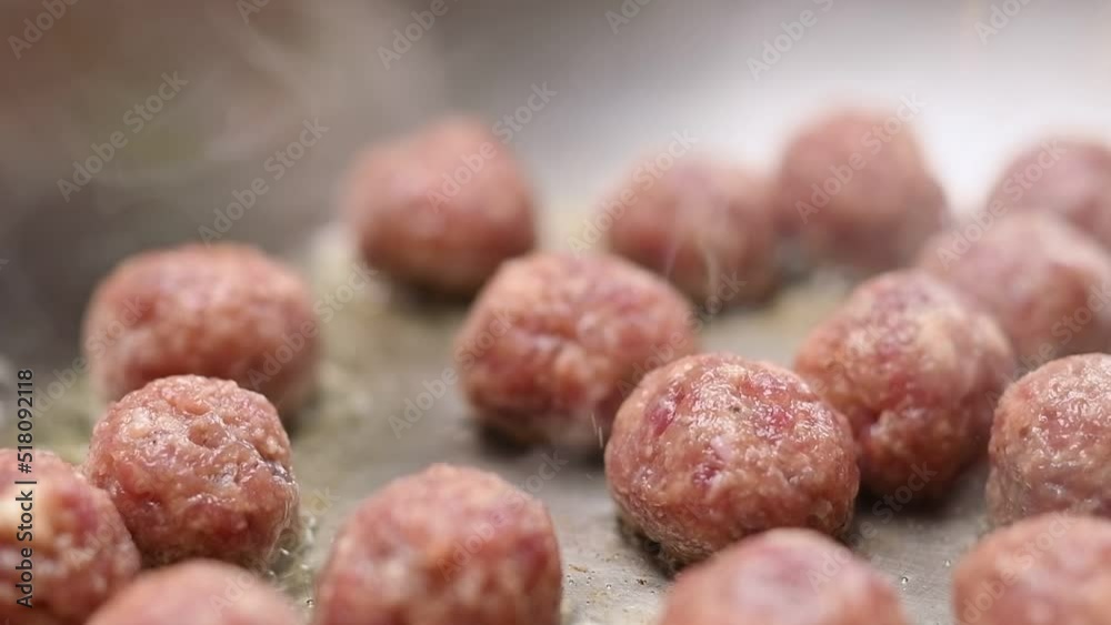 Frying of delicious small meatballs in frying pan. Frying of delicious small meatballs in frying pan.