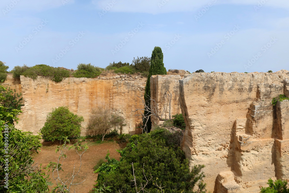 Lithica, Pedreres de s'Hostal, Menorca (Minorca) island, Spain. The sandstone quarries overgrown by trees and vegetation with labirynths and gardens