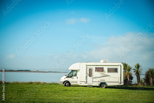 motorhome on a camping ground, caravan vacations, campervan trip