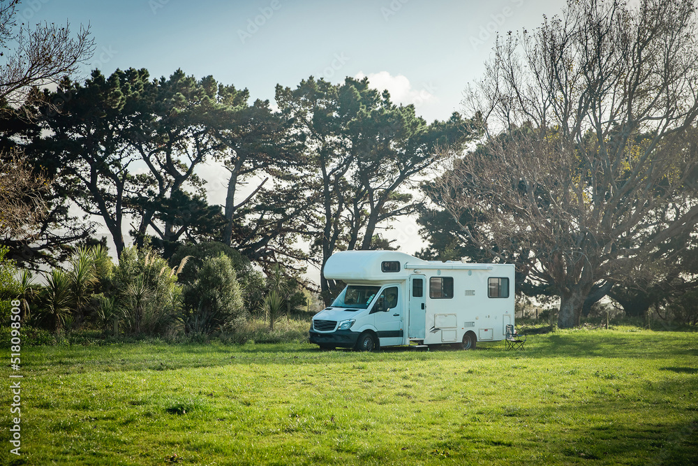 motorhome on a camping ground, caravan vacations, campervan trip motorhome on a camping ground, caravan vacations, campervan trip