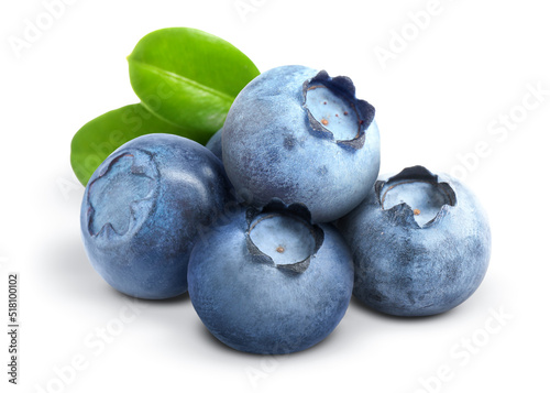 Tasty fresh ripe blueberries with green leaves on white background
