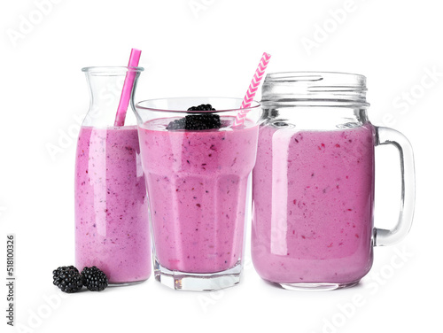 Set of delicious blackberry smoothies on white background