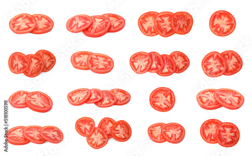 Set with slices of tasty ripe cherry tomatoes on white background