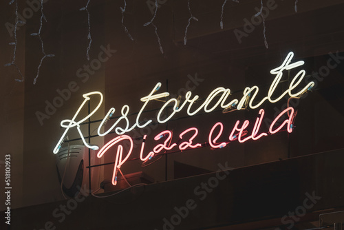 Neon signs vector. Restorante Pizzeria  design template neon sign, light banner, neon signboard, nightly bright advertising, light inscription. Vector illustration.  photo
