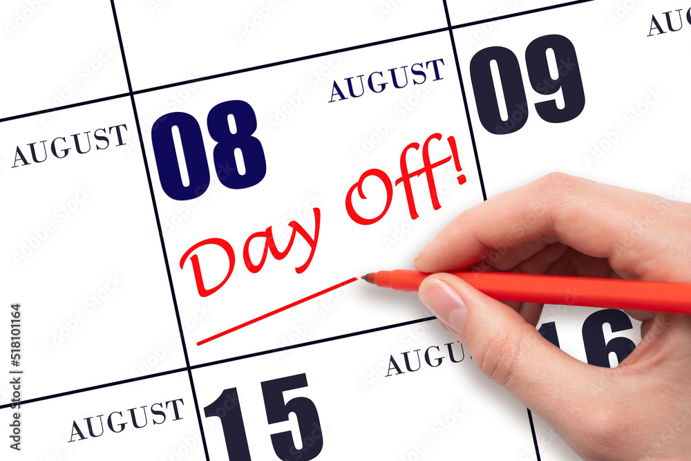 Hand writing text DAY OFF and drawing a line on calendar date 8 August. Vacation planning concept. Hand writing text DAY OFF and drawing a line on calendar date 8 August. Vacation planning concept.
