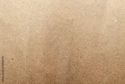 Texture of kraft eco paper, from recycling. Close up of a cardboard surface.
