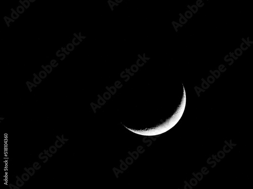 Crescent Moon Isolated in Black Night Sky