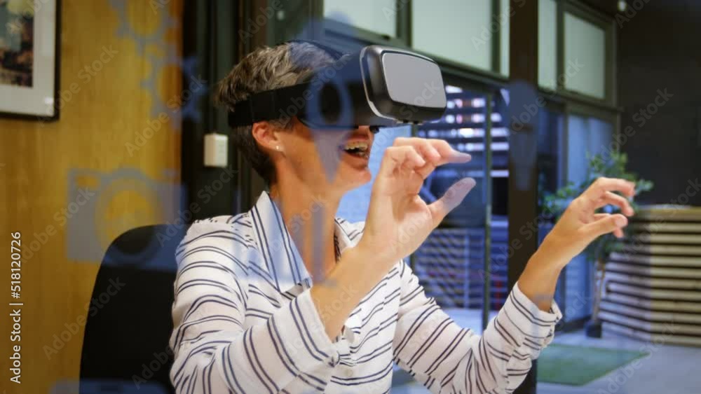 Animation of digital icons over caucasian businesswoman wearing vr headset Animation of digital icons over caucasian businesswoman wearing vr headset