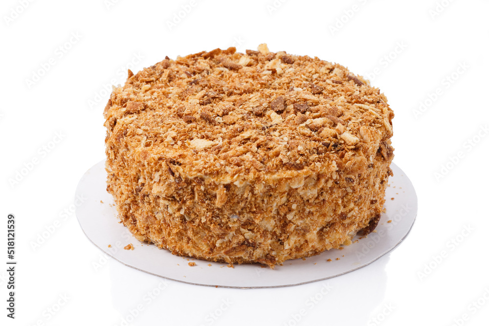 Napoleon cake on white background isolated closeup Napoleon cake on white background isolated closeup