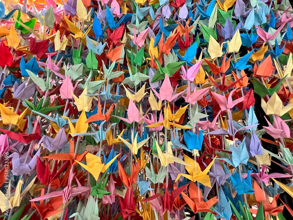 thousand of paper crane or japnaese paper orizuru background, a blessing culture in Japan