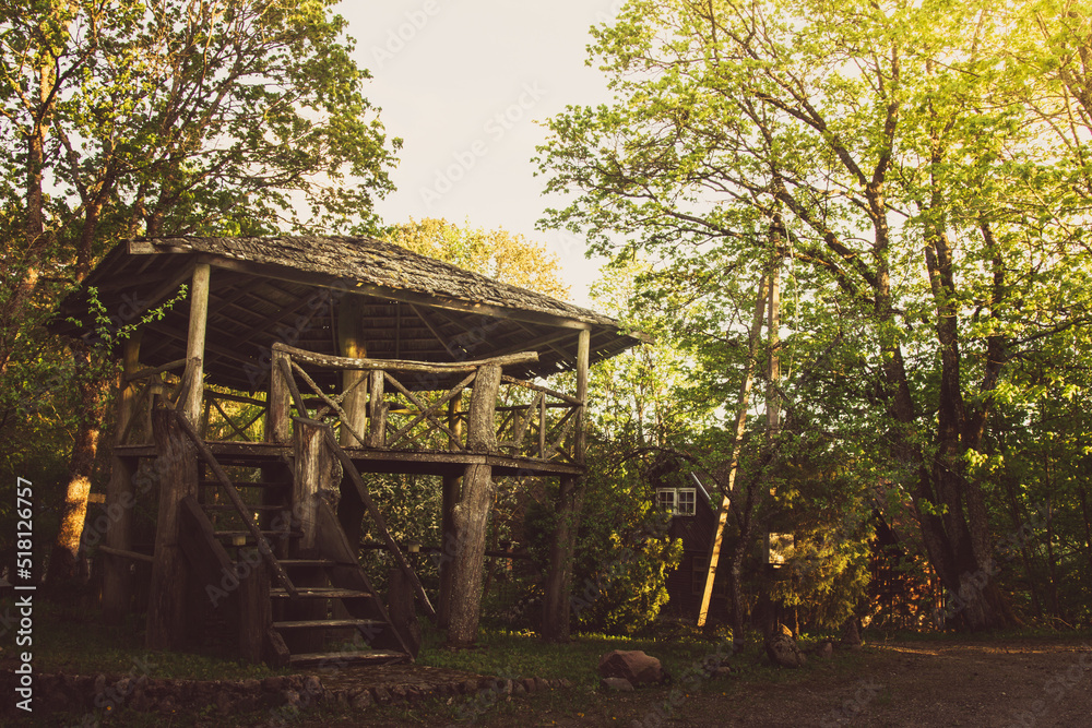 Old wooden terrace outdoors made in forest outdoors. Relaxation and quite space outdoors Old wooden terrace outdoors made in forest outdoors. Relaxation and quite space outdoors