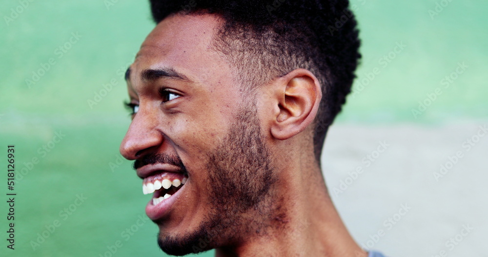 Fototapeta premium Relaxed black mixed race man outside close-up face