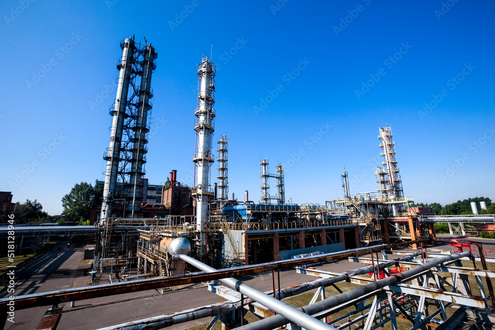 Refinery factory oil pipelines. Oil and gas petrochemical industrial background Refinery factory oil pipelines. Oil and gas petrochemical industrial background