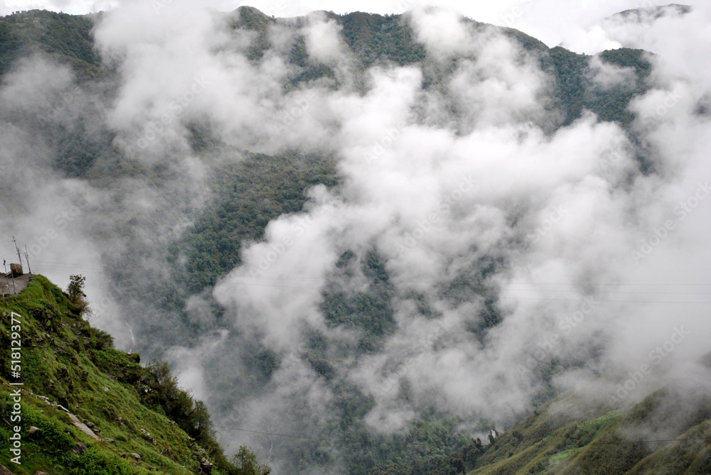 The mist covered terrain turns green during monsoon look mesmerizing at Tsomgo Lake area situated at 12,600 ft altitude under Pangolakha Wildlife Sanctuary in Sikkim...