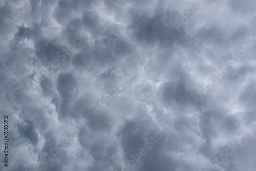 Background of mammatus clouds in gray color