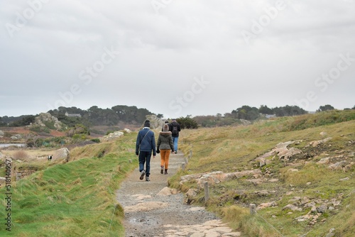 Group of people visiting the Brittany coast in France © aquaphoto