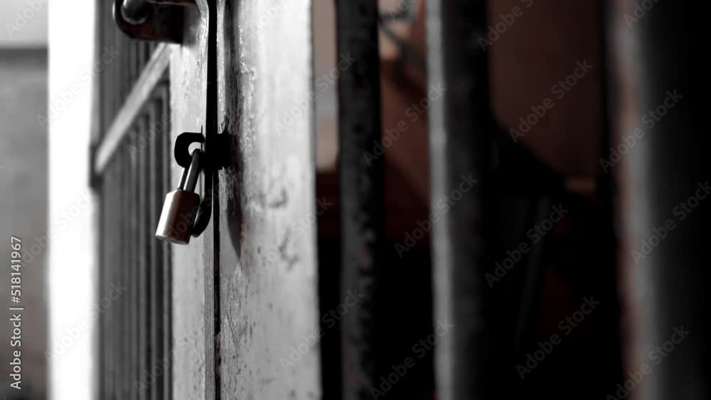 Rusty iron door is locked. Rusty iron door is locked.